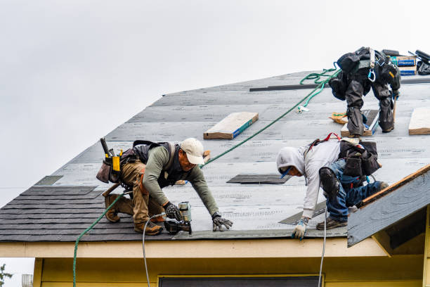 Professional Roofing technician working in Clayville, RI